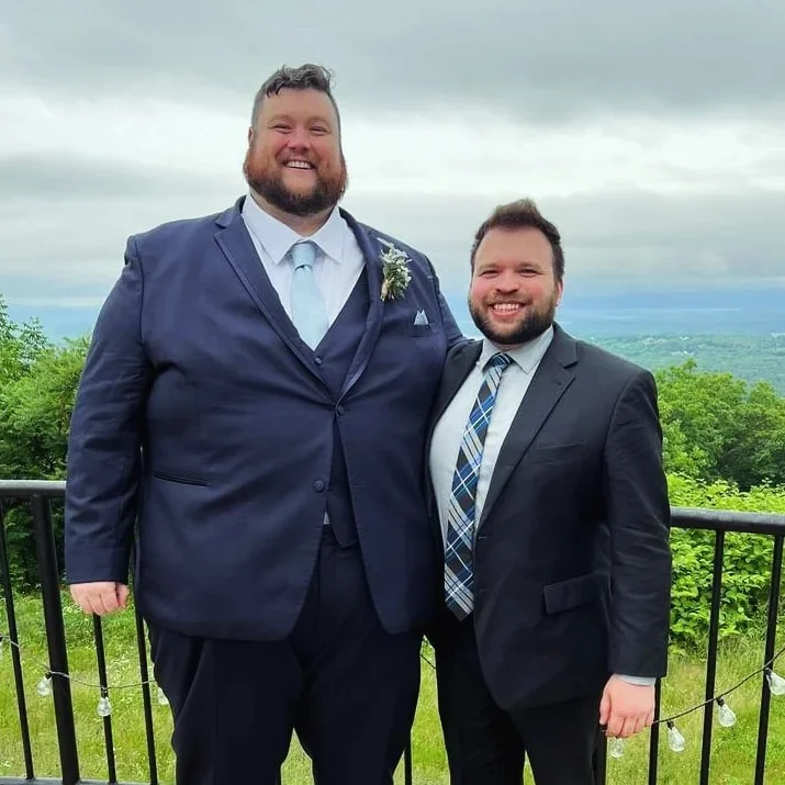 Navy Three Piece With a Pale Blue Tie for an Outdoor Ceremony