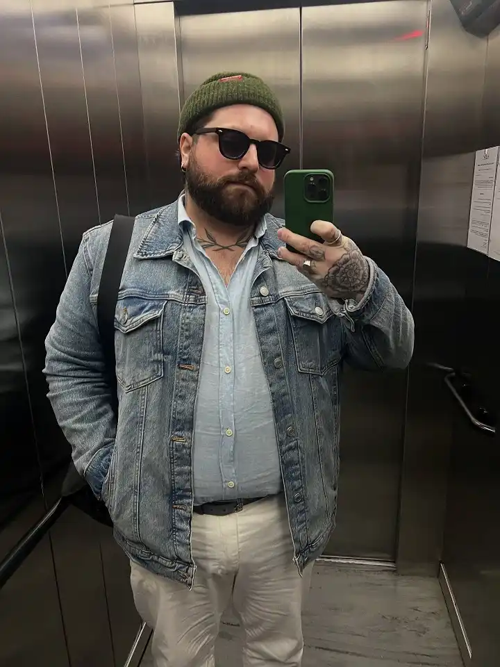 18 Winter Office Outfits for a Bigger Frame 7 Denim Jacket Over a Light Blue Shirt for Casual Office Days