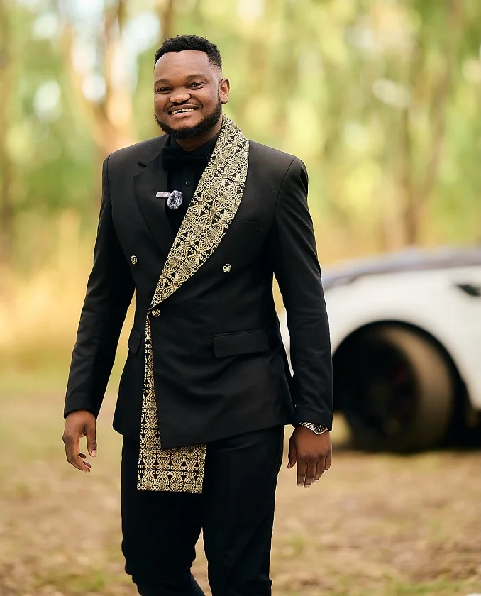 All Black Suit With a Gold Patterned Lapel Sash