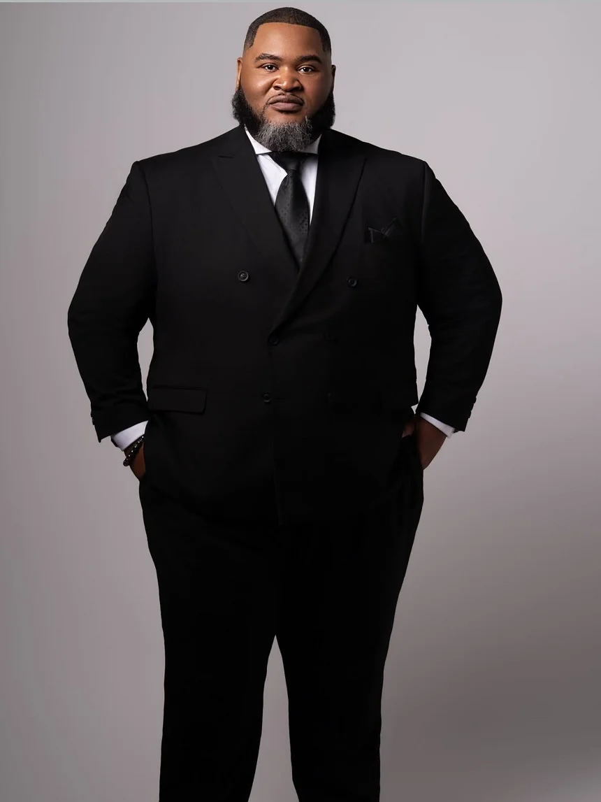 18 Winter Office Outfits for a Bigger Frame 15 Black Double-Breasted Suit With a Tonal Tie for Formal Days